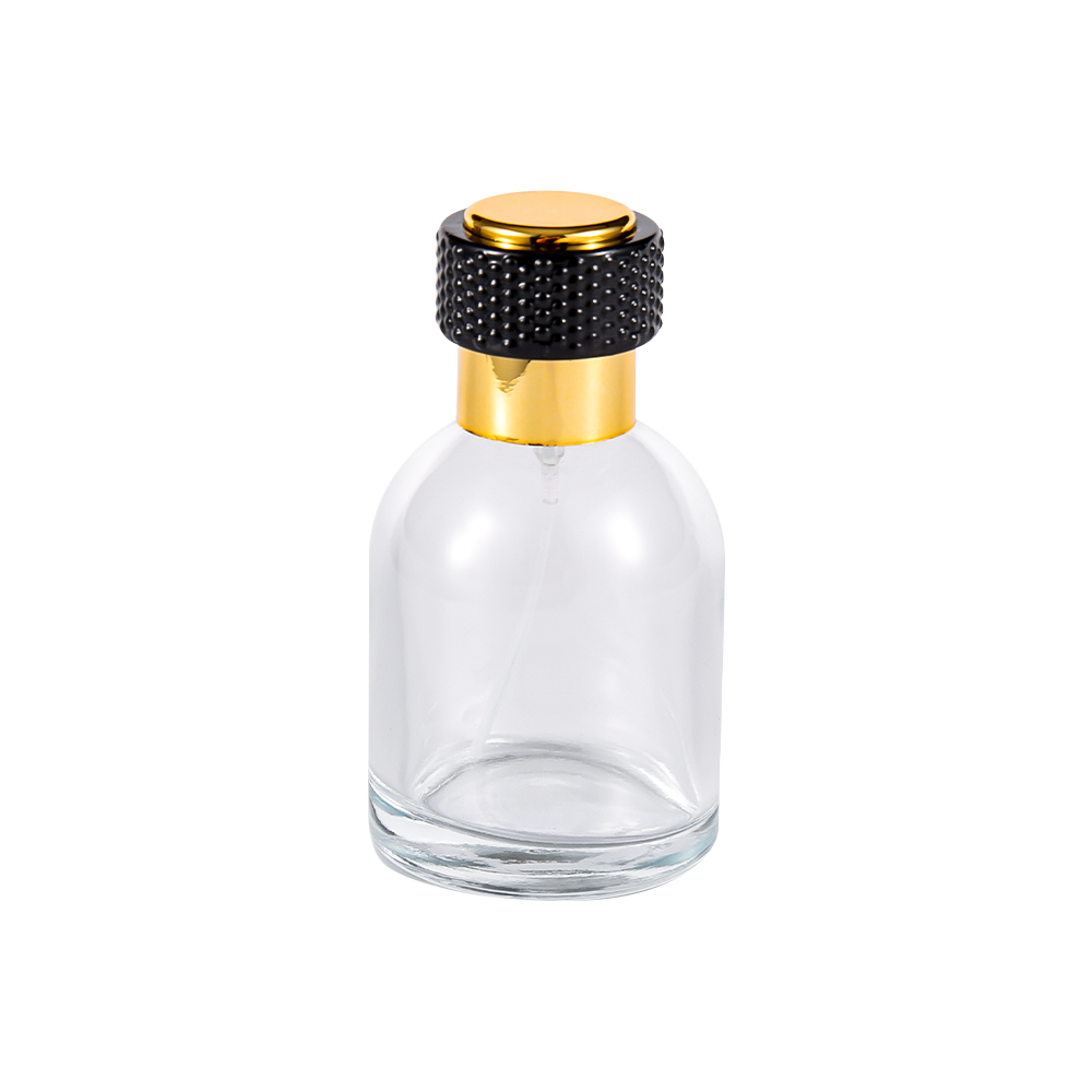 GC3986-WJ816 50 ml parfumeflaske i klart glas med Uv-guld plastikhætte og sort del